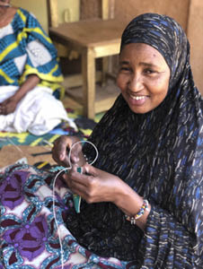 With Refugees Tassel